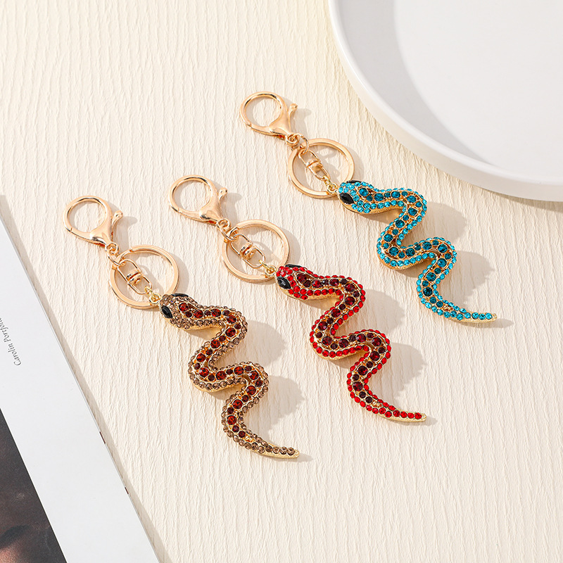 Factory direct new Zodiac zinc alloy snake diamond keychain fashion Joker creative small gifts wholesale