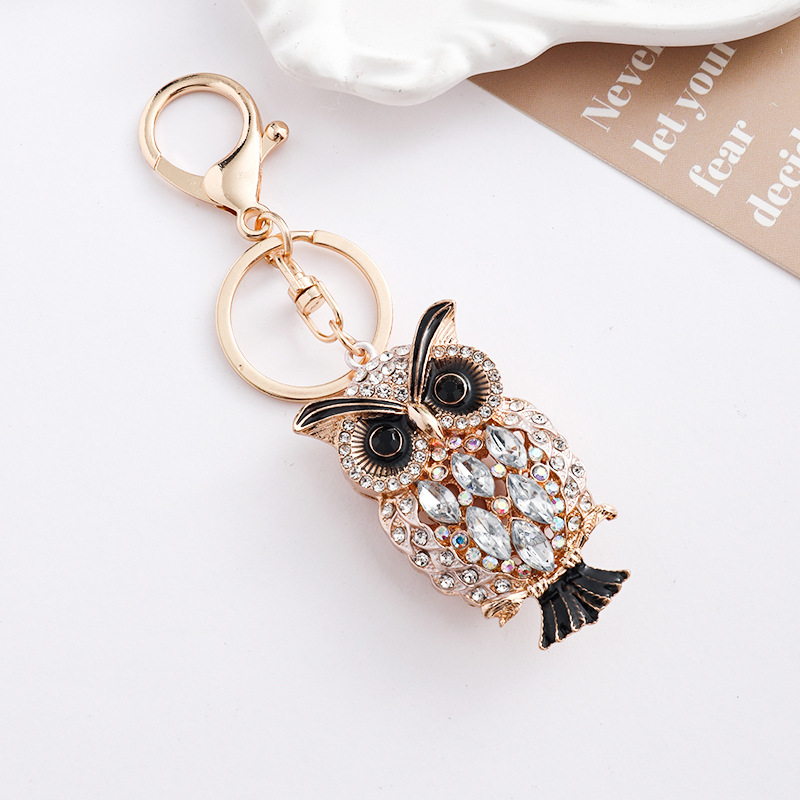 Europa y América creativa transfronteriza estilo hueco búho llavero de metal con diamantes bolsos de automóviles para animales colgantes de regalo
