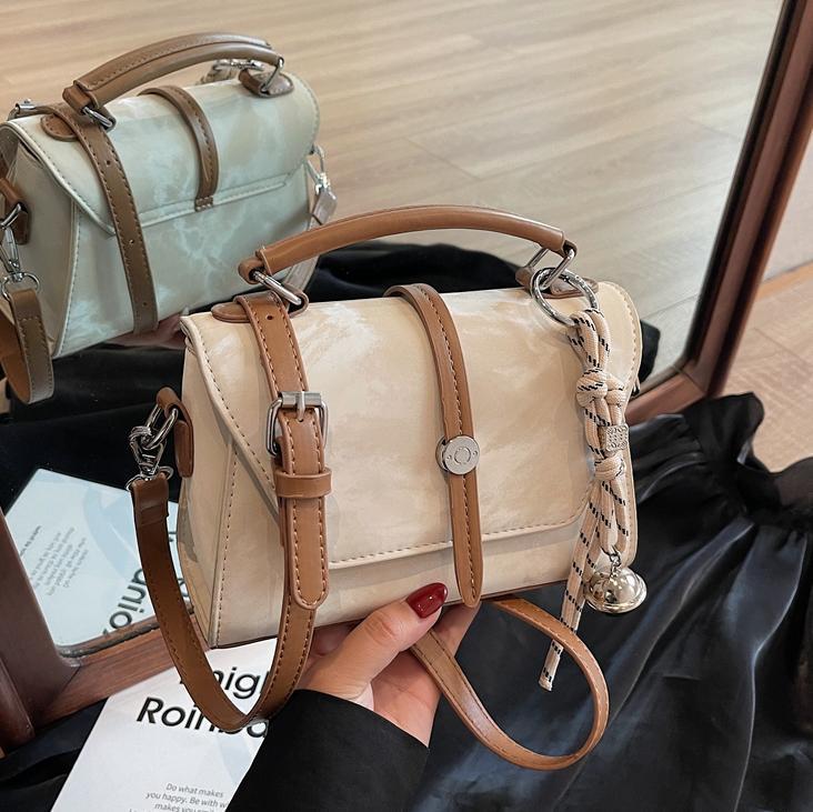 Bagos de estilo exterior para damas 2025, nuevo bolso de mano popular, bolso de mano caliente, bolso de alta calidad.