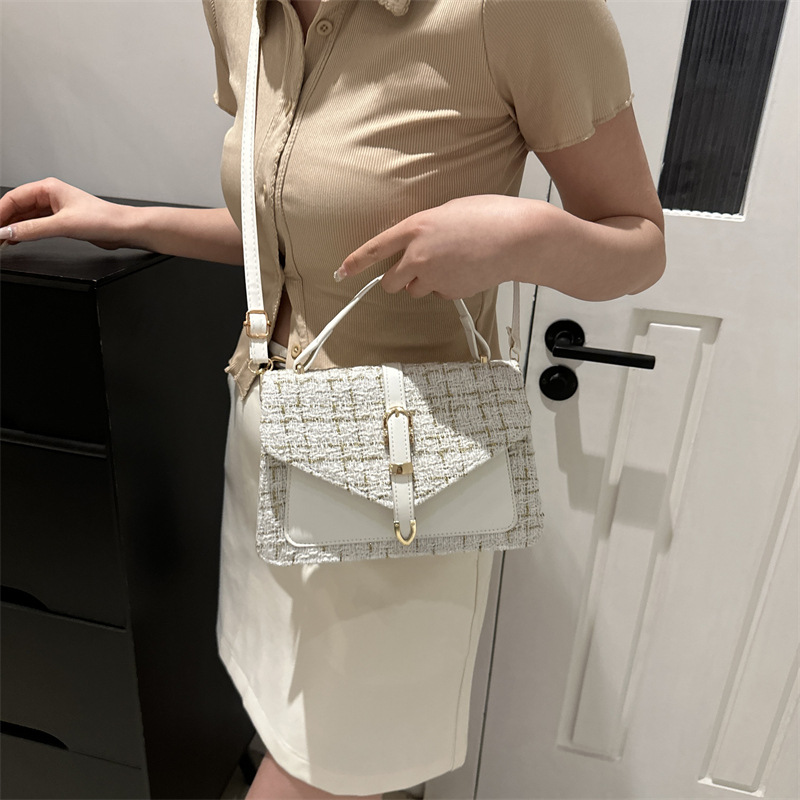 Diseño de nicho de lujo ligero bolso de lana cuadrado este año nuevo estilo coreano versátil bolso de hombro de un solo hombre de oficina estricado