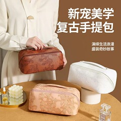 复古压花枕头化妆包跨境PU轻奢女洗漱护肤便携收纳手提化妆品包现