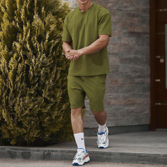 夏の綿の薄いタイプのカジュアルなスーツのフルセットのハイエンドの潮男のNKの半袖の半ズボンのtシャツのスーツのメンズの工場の現物