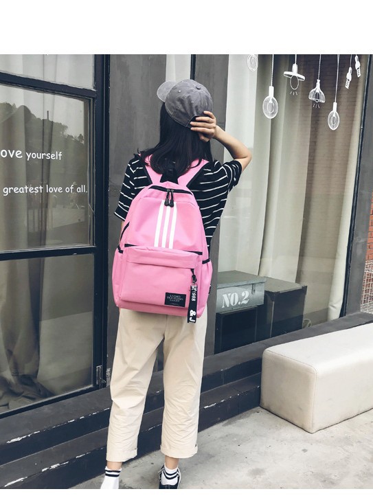 Nueva lona de tres barras mochila de moda coreana mochila de escuela secundaria mochila de viaje para hombres y mujeres mochila de escuela secundaria