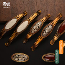 厂家直销欧式抽屉橱柜锌合金复古把手咖啡猫眼拉手黑棕柜门新中式