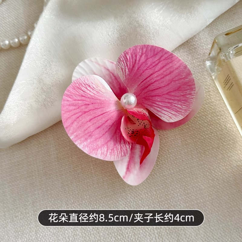 Puramente deseoso de viento colorido primavera orquídea mariposa broca de flores laterales flores simuladas tocado de flores al por mayor acrobacias para el pelo de viajes al mar