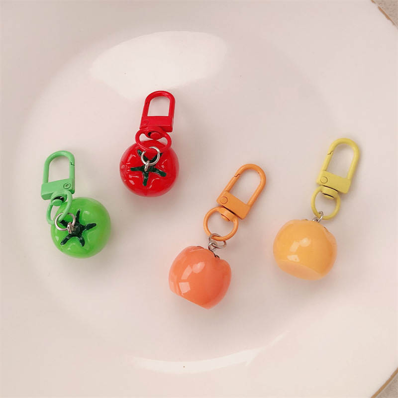 Simulación creativa personalidad fruta tomate colgante llavero de resina cadena colgante niña corazón bolso colgante accesorios