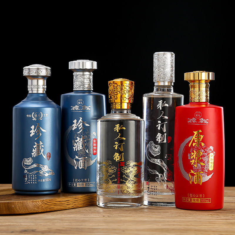 大量批发酒瓶及包装带盖密封瓶 白酒瓶一斤装晶白玻璃500ML空酒瓶