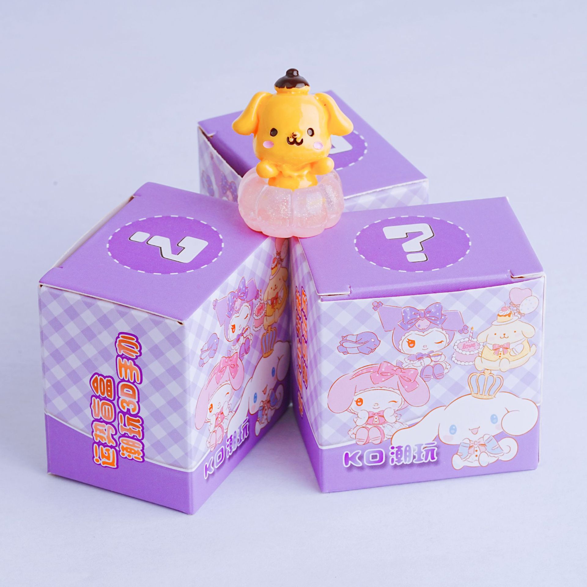 かわいいアニメの三麗欧の手はブラインドの箱の少女の心の高い顔の値の公の子供のデスクトップの置物の潮があります。