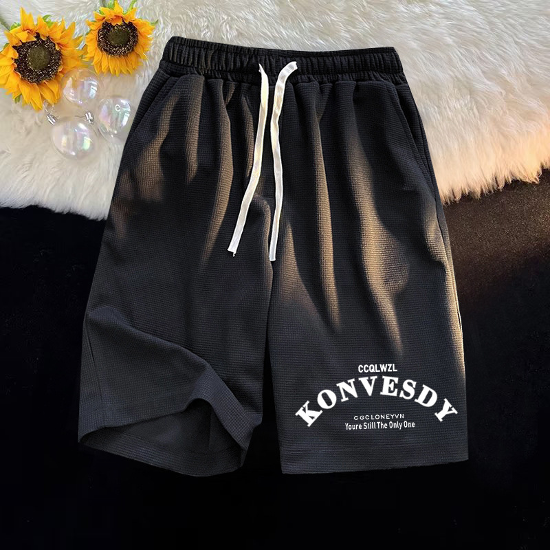 Waffle casual minimalista para hombres, camiseta de manga corta de verano, pantalones cortos para hombres con un conjunto de ropa de moda.