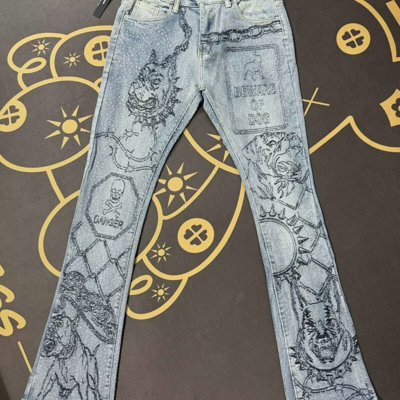 Trendy brand, all-over printed, rhinestone-embellished, slightly flared jeans for men, distressed blue, with a unique dog and skull print Trendy brand, all-over printed, rhinestone-embellished, slightly flared jeans for men, distressed blue, with a unique dog and skull print