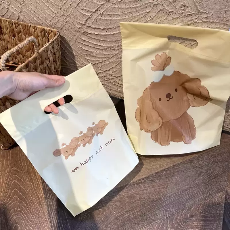 磨砂布丁狗手提袋奶油黄色购物塑料袋饰品内衣化妆品加厚包装袋