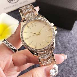 手表镶钻金色男2025时尚圆形新款轻奢手表女士INS气质简约石英表