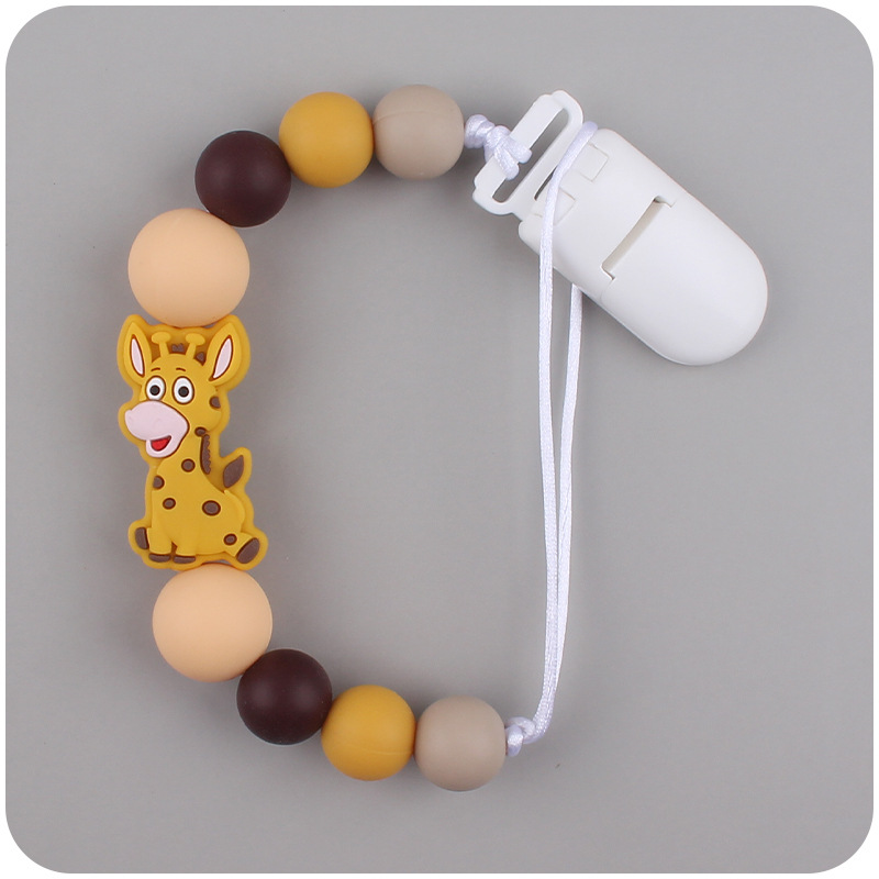 Nuevo bebé suministros chupete cadena creativa de dibujos animados jirafa silicona bebé mordedura cadena anti-caída molar