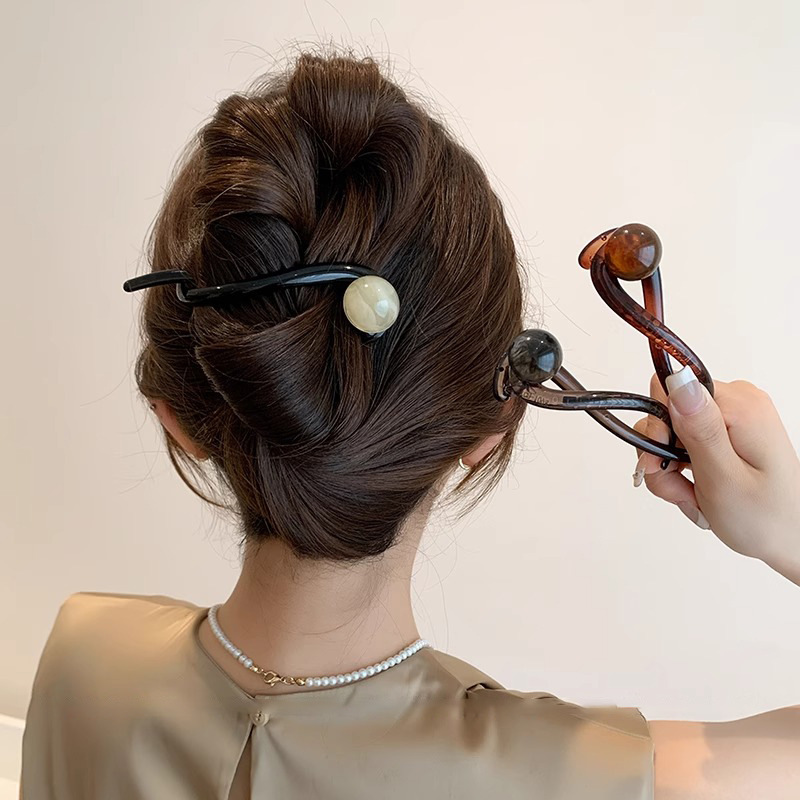 Simple perla clip de cabello para mujeres 2025 nuevo clip de cabello de alta calidad detrás de la cabeza torcida clip de cabello de una palabra tocado