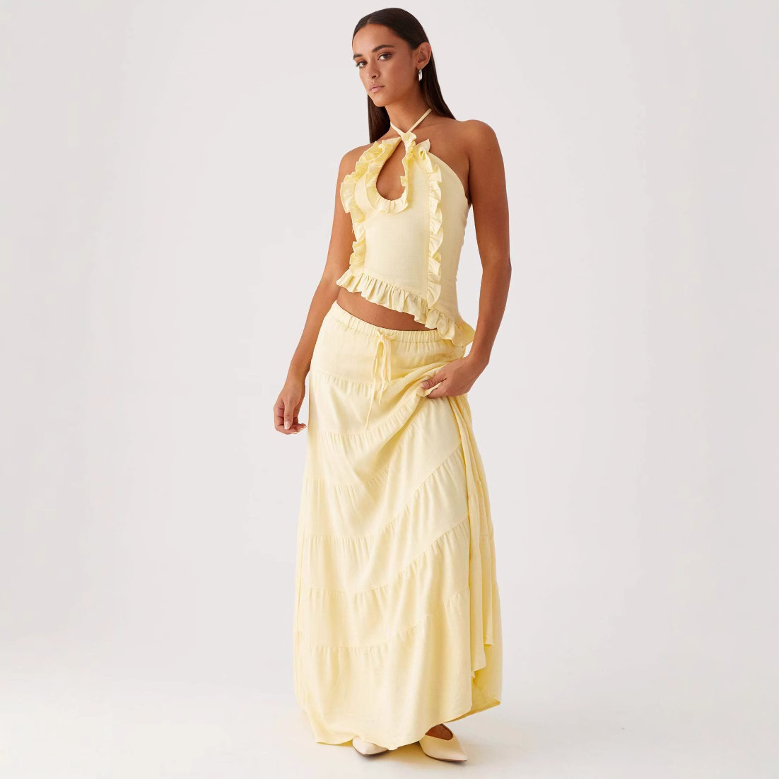 Pure and alluring lotus leaf halter neck set! Elastic waist, layered, full skirt, two-piece vacation set.