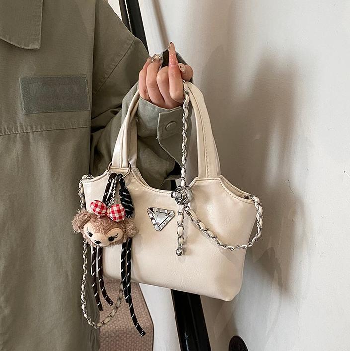 Bolso de mano explosivo transfronterizo para mujeres 2025 primavera nueva cadena de bolso de hombro universal de alta calidad bolso de cubo de agua