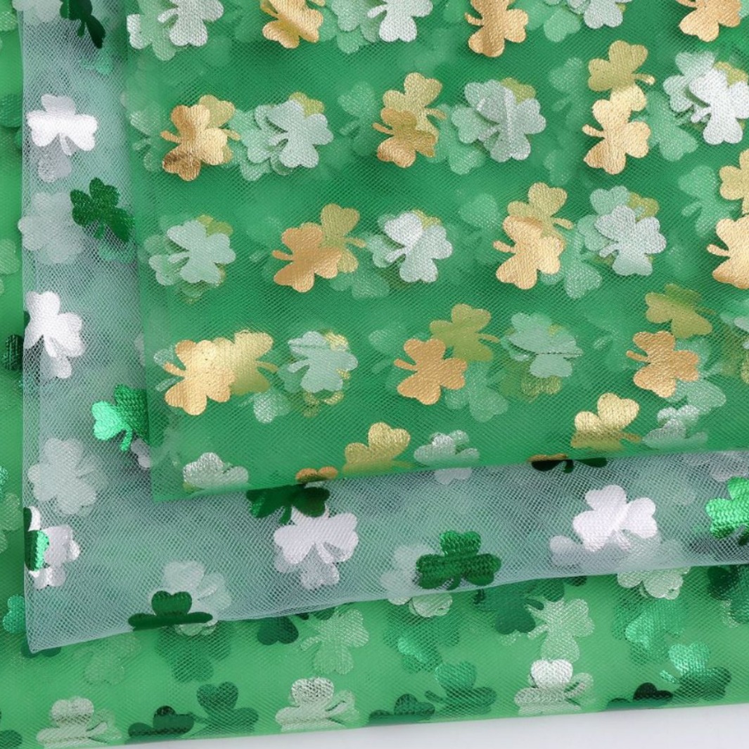 厂家直销瑞士网烫金绿色三叶草中硬蓬蓬裙演出服 舞蹈服网纱面料