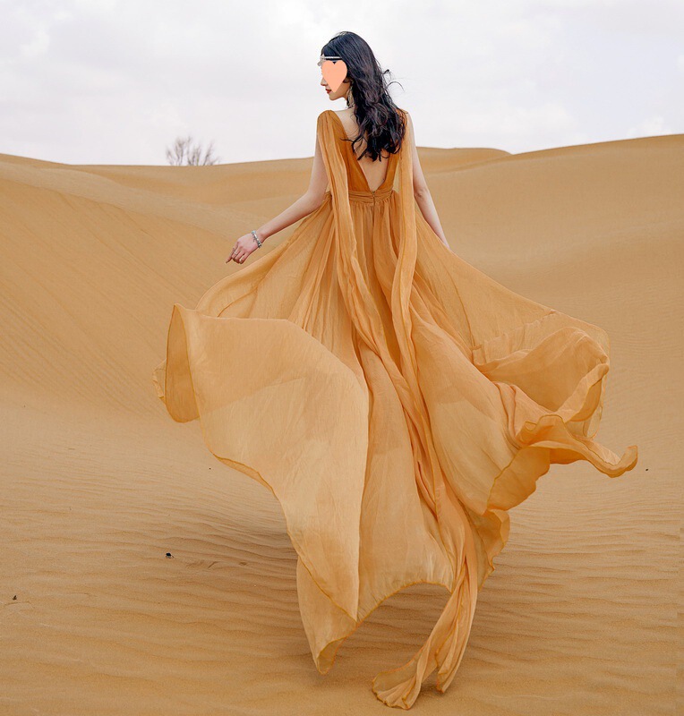 New Women's Clothing Xinjiang Qinghai Xizang Desert Island Travel Chiffon V-Neck Champagne Gold Backless Tail Dress