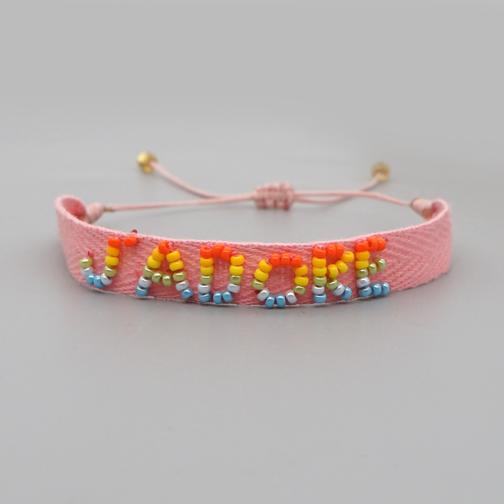 Bohemian Ribbon Rice Bead Woven Rainbow Letter Bracelet display picture 21