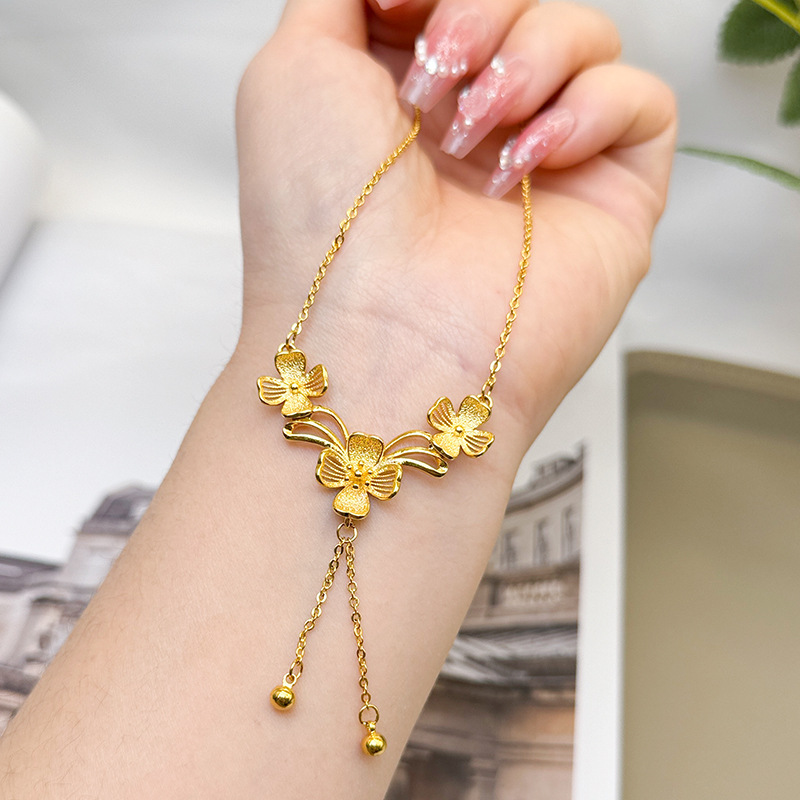 Estilo antiguo arena oro Sansheng flor borla collar vintage Flor del todo-fósforo de las mujeres populares estilo chino Yiwu joyería suministro