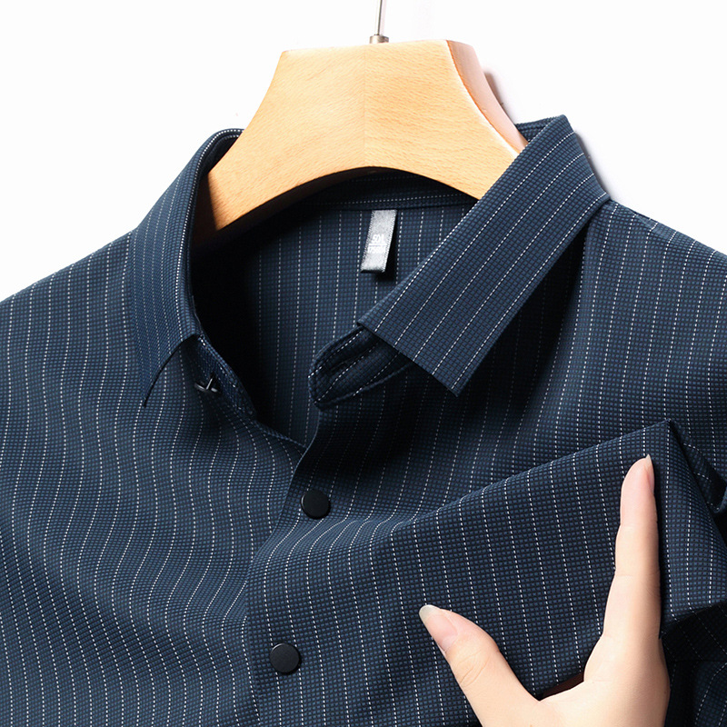 Camisa sin costuras para hombres Primavera y otoño Nueva solapa a rayas camisa de manga larga de negocios jóvenes y de mediana edad sin planchar ropa superior para hombres