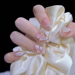 Popular online influencers' mid-length, ice-clear butterfly camellia-style sheer-look nail stickers—wholesale nail tips for stunning manicures