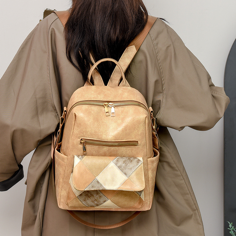 Transfronterizo nuevo estilo coreano mochila de gran capacidad para mujer PU mochila de cuero suave moda rombo mochila de viaje multifuncional