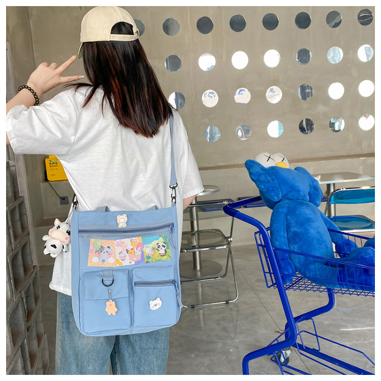 Large-capacity Japanese-style single-shoulder canvas bag for girls, versatile crossbody, ins, a tote bag for junior high school students' classes, and a schoolbag for after-school tutoring undefined