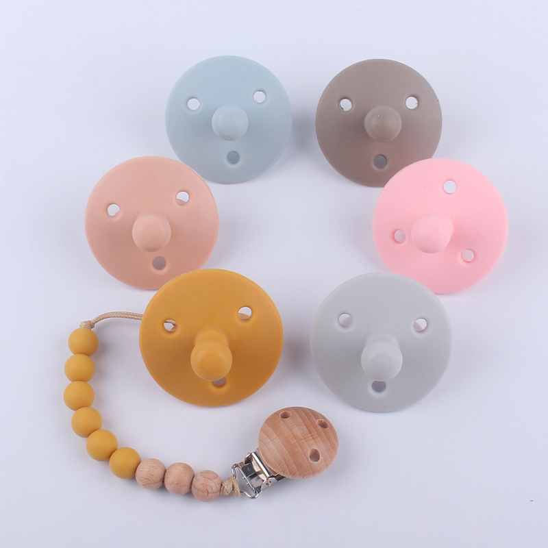 Nuevos suministros para bebés chupete bebé pezón de silicona creativo bebé mordida Cadena de pezón de silicona conjunto de dos piezas