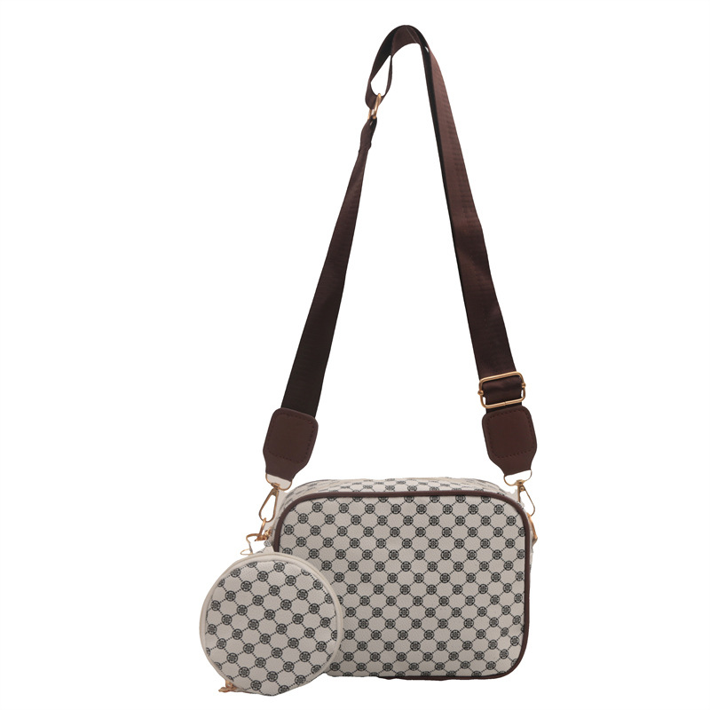 2024 nueva moda simple retro bolso impreso de mujer extranjero ancho cinturón de hombro bolso de hombro casual bolso de mochila