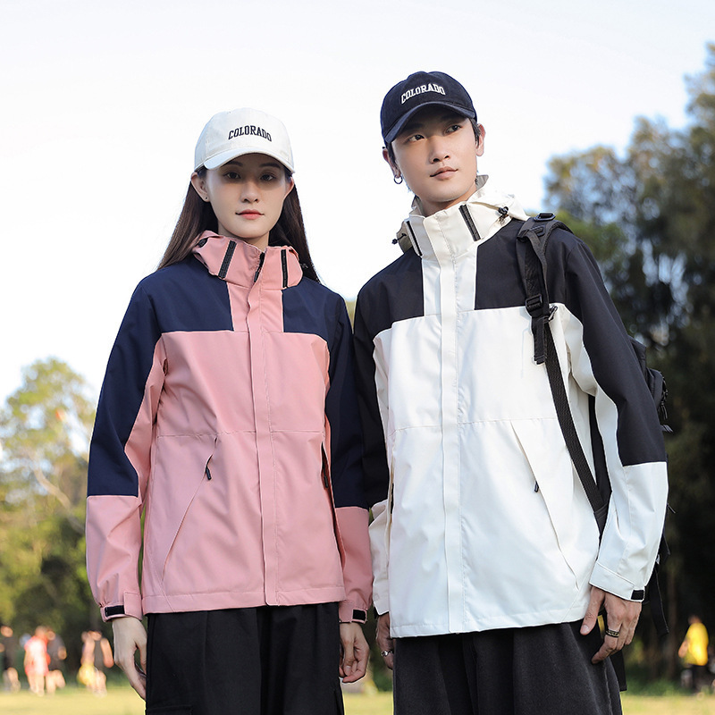 Primavera y otoño deportes al aire libre pareja de moda casual sombrero desmontable color a juego hombres y mujeres chaqueta delgada entrega en vivo