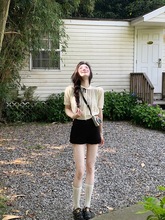 甜美娃娃领短袖针织衫女夏季2025新款减龄镂空短款休闲单排扣上衣