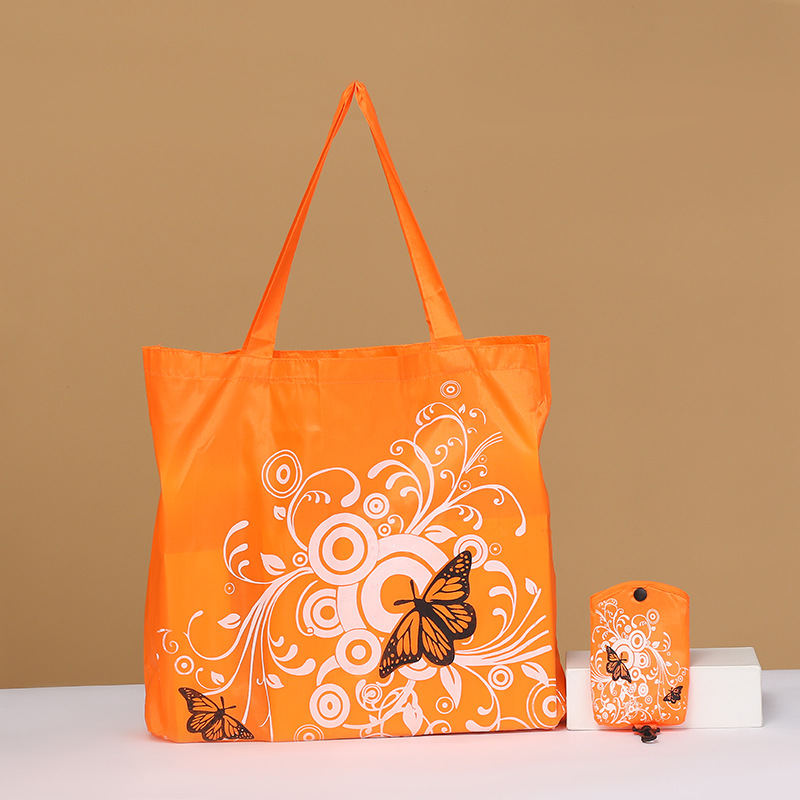 Bolsa de compras plegable de flores de mariposa Portátil Bolsa de protección ambiental en stock logotipo imprimible bolsa de almacenamiento de tela de poliéster Oxford