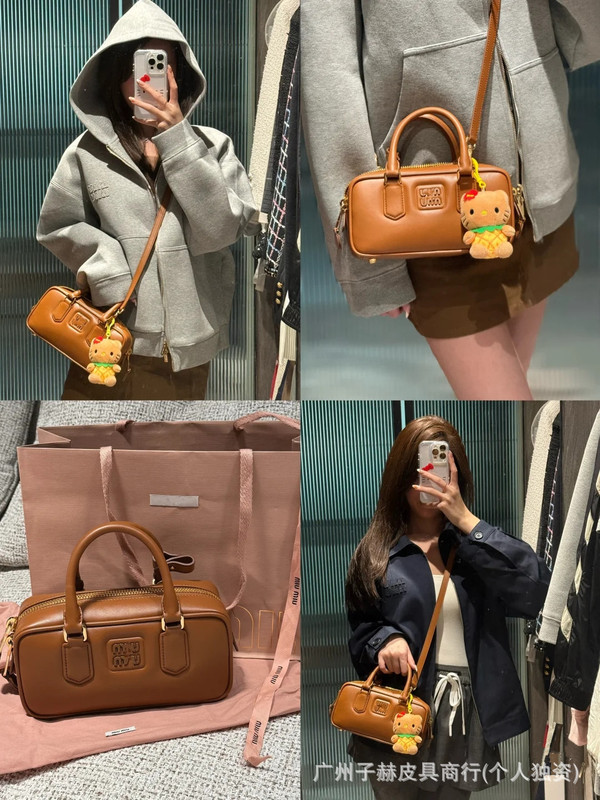 元工場の新型iuボーリングシンプルなファッションハンドバッグボストンシングルショルダーは大容量の公文書にまたがっています。|undefined