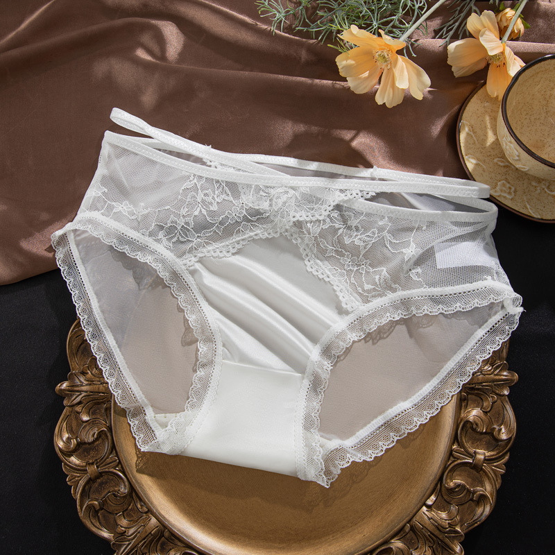 Ropa interior de malla de encaje puro francés mujer sexy banda hueca ligera de lujo doble piel agradable para la piel chica de cintura media entrepierna antibacteriana