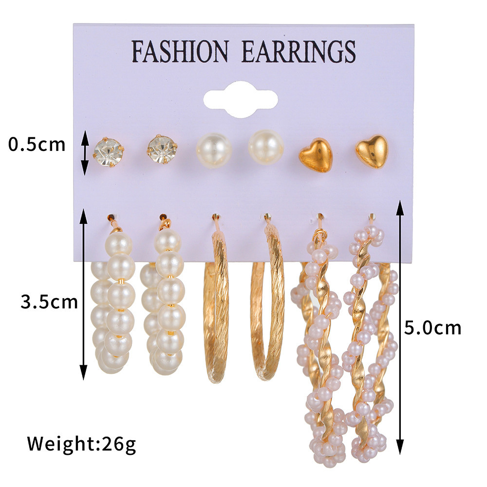 Korean Pearl Heart C-shape Earrings Wholesale Nihaojewelry display picture 1