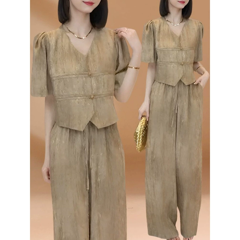 Модный и элегантный женский комплект: топ с коротким рукавом и широкие брюки, новый летний набор для стройности 2025 года.