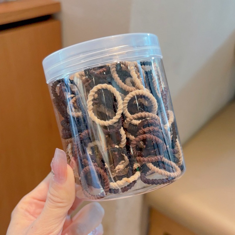 Las muchachas de la cuerda del pelo del color del caramelo no hacen daño al pelo pequeña tira de goma Lazo de la cuerda del pelo tocado niños lindos cubierta de cuero de la banda del pelo del bebé