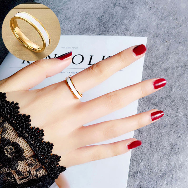 Personalidad de moda anillo de dedo índice de viento frío epoxi en blanco y negro femenino europeo y americano simple