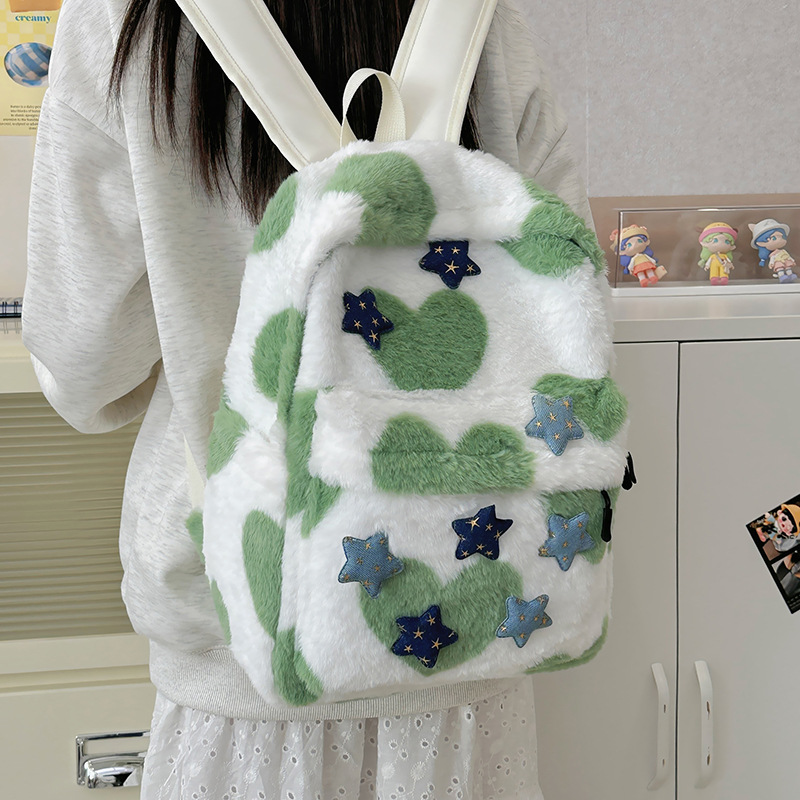 La versión coreana de la mochila de peluche es una mochila de doble hombro, el diseño de nicho japonés de la mochila de alto valor facial, la mochila de clase de las estudiantes universitarias.
