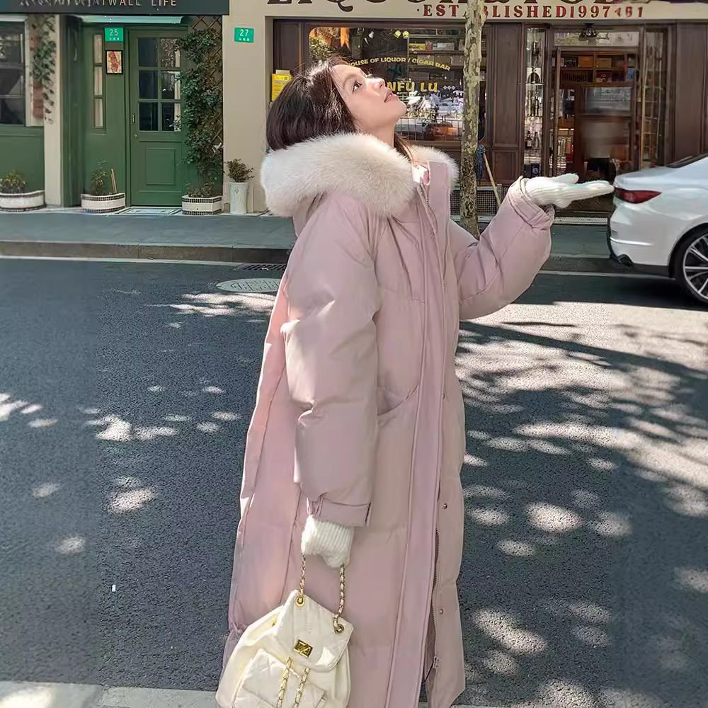 Gran abrigo de algodón de plumón largo de cuello de cabello para mujeres 2024 nuevo abrigo de algodón suelto de invierno grueso chaqueta de rodilla