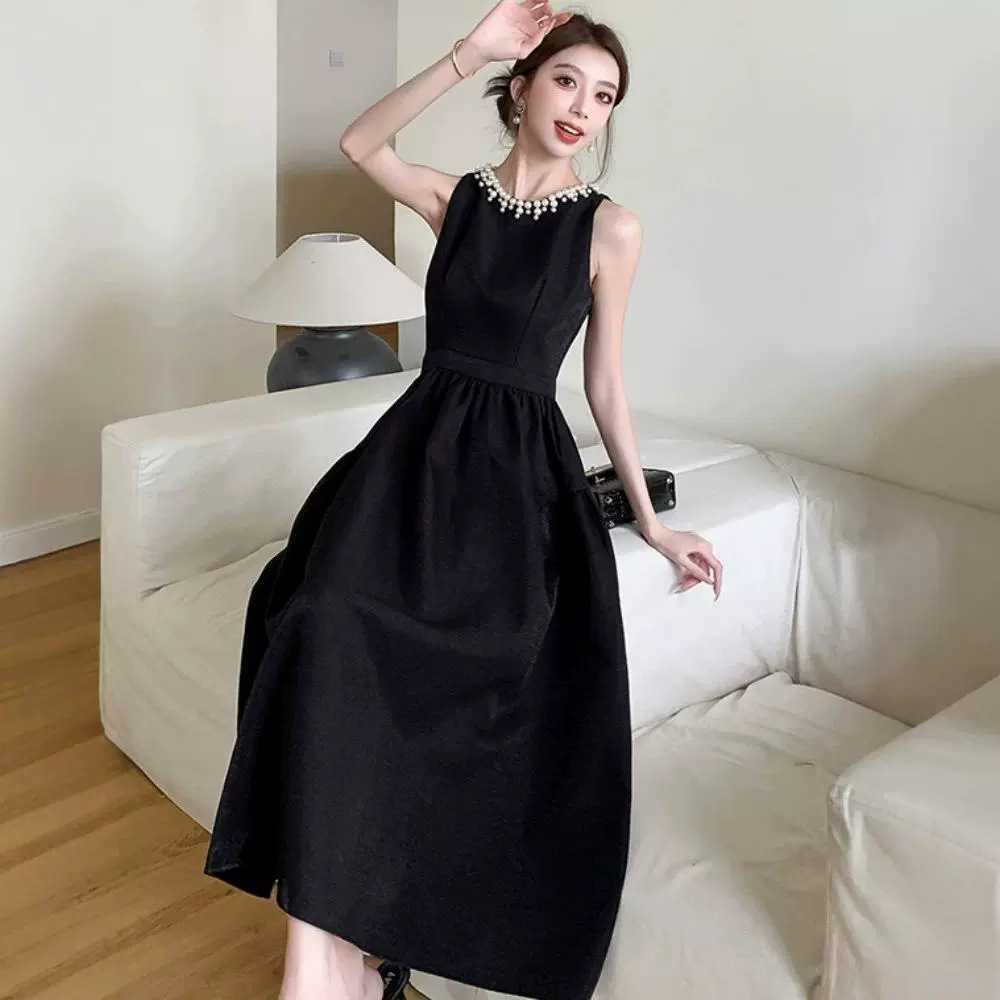 Europa estación chaleco negro vestido de mujer verano lujoso ligero Hepburn vestido de noche con perlas de estilo de alto rendimiento vestido largo