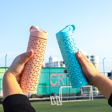 多彩镂空塑料外套摔不破太空杯 双层隔热设计时尚外观提手水杯