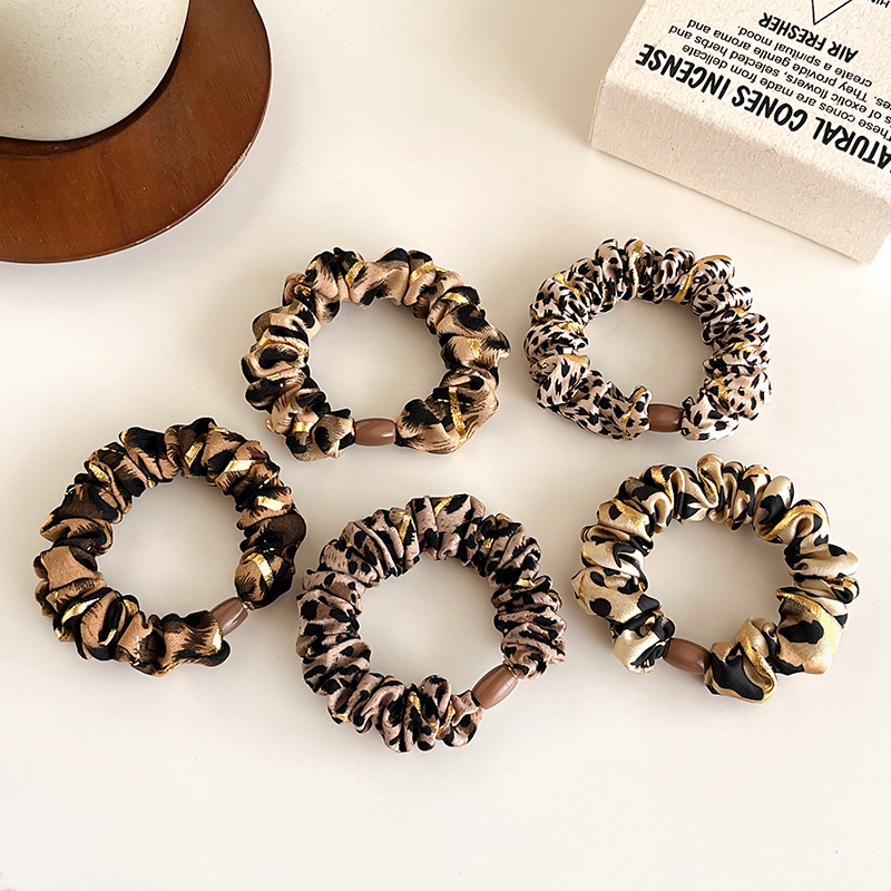 Temperamento europeo y americano estampado leopardo anillo de cabello simple de alta elástica cuerda de cabello gruesa cuerda de cabello de bolas duradera correa