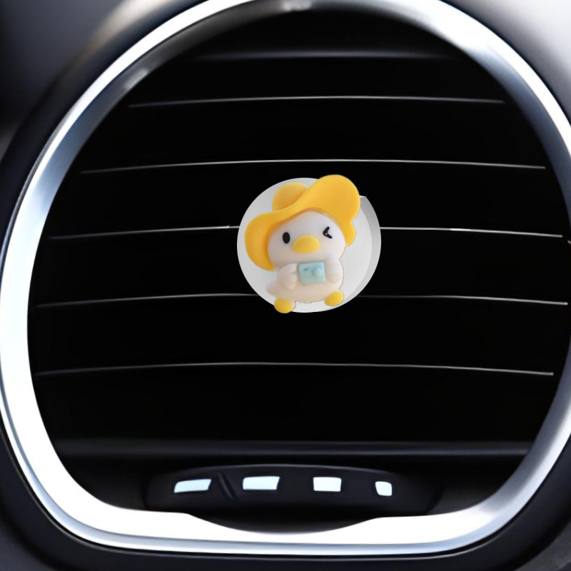 Clip de salida de aire de coche pequeño pato amarillo resina aromaterapia de coche perfume de coche adornos de dibujos animados accesorios de decoración suministros de coche