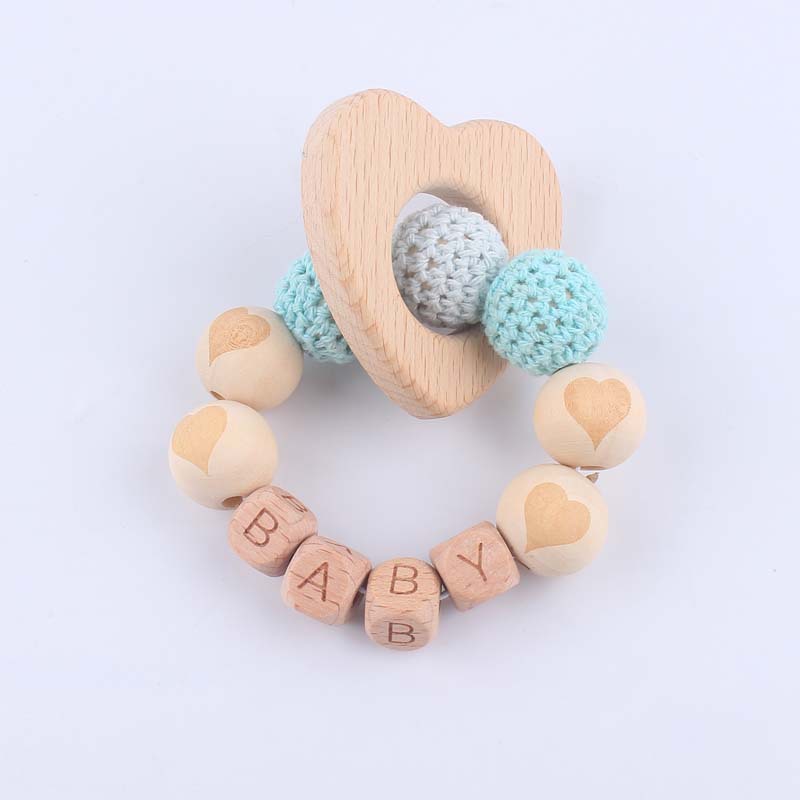 Bebé suministros de dibujos animados de haya amor mordedor creativo DIY dibujos animados amor patrón mordedura pulsera teether juguete