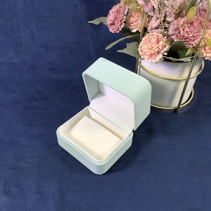 Cubierta de ángulo redondeado fresco caja de joyería de cuero PU caja de embalaje de joyería de moda anillo brazalete embalaje de joyería