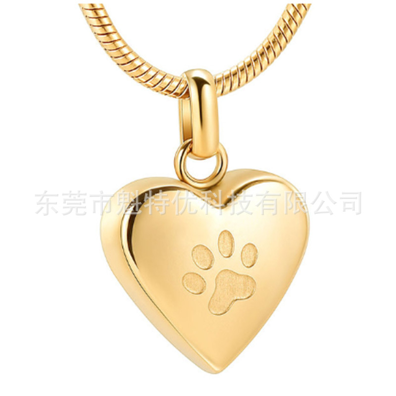 Japonés y coreano nuevo collar de acero de titanio de las mujeres no se desvanece en forma de corazón pata de impresión conmemorativa gato y perro mascota cinerario ataúd colgante impermeable