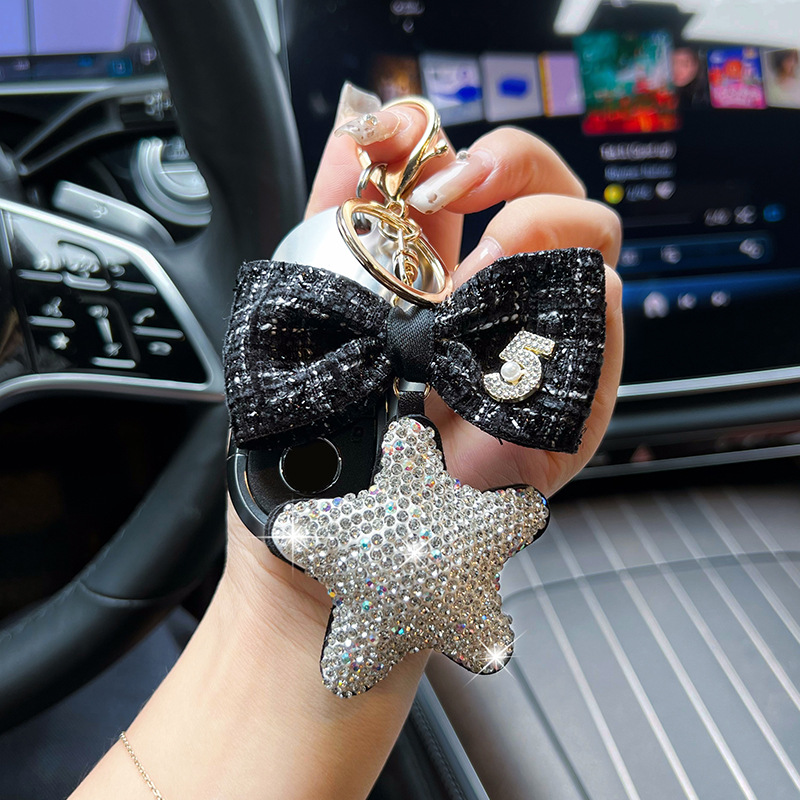 Cerámica creativa con diamantes de arcilla de cinco puntas arco pequeño llavero de viento fragante nuevo cuero estrella bolsa decoración colgante