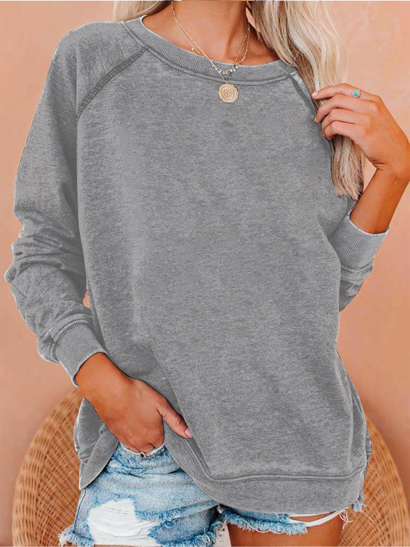 Primavera y otoño Amazon raglán suéter casual europeo y americano suelto de gran tamaño cuello redondo costura mujer manga larga transfronteriza mujer